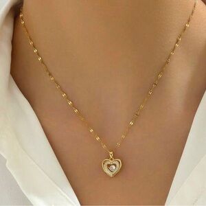 Elegant Gold Heart Necklace with Silver Detailing